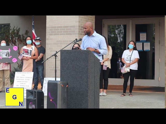 Karif Lawrence addresses rally protesting racism against the Hmong community
