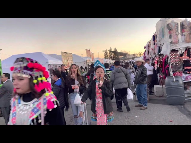 Fresno Hmong new year. Food booths packed with customers during last hour of final day, 1/1/2023.