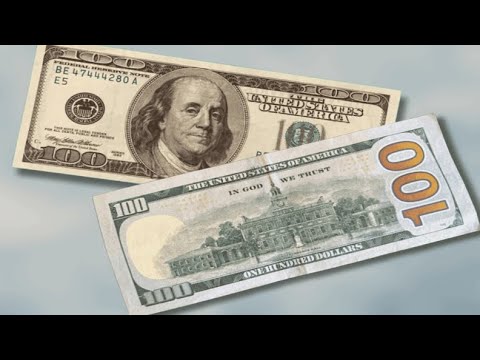 In God We Trust_The US currency. Lu Lug Vaajtswv Tug Peb Ntseeg kws nyob rua ntawm dlaim nyaj Meskas