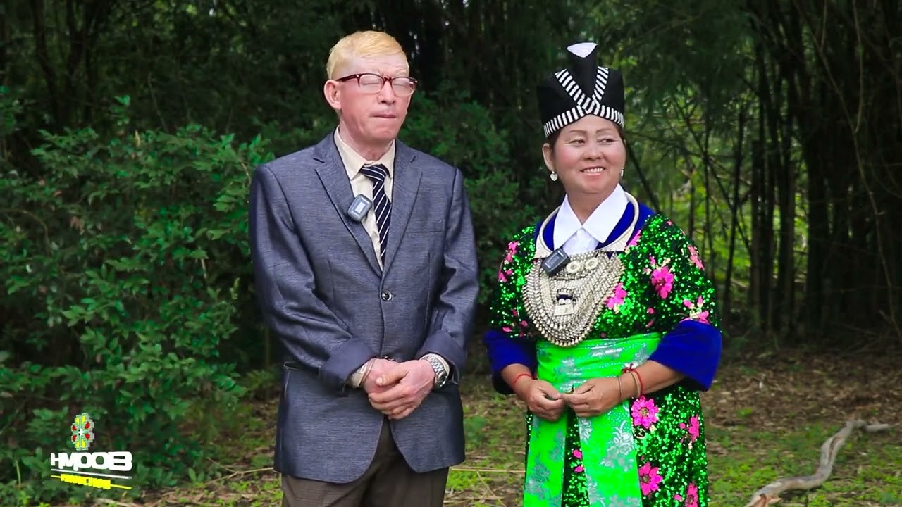 Kwv txhiaj khib siab heev yog tsis tau koj by Txhiaj kaus xyooj thiab Paj iab vaj